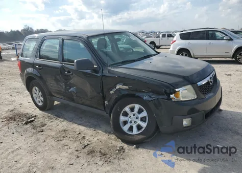 2010 Mazda Tribute I из США, поврежденный, VIN 4F2CY0C76AKM02299
